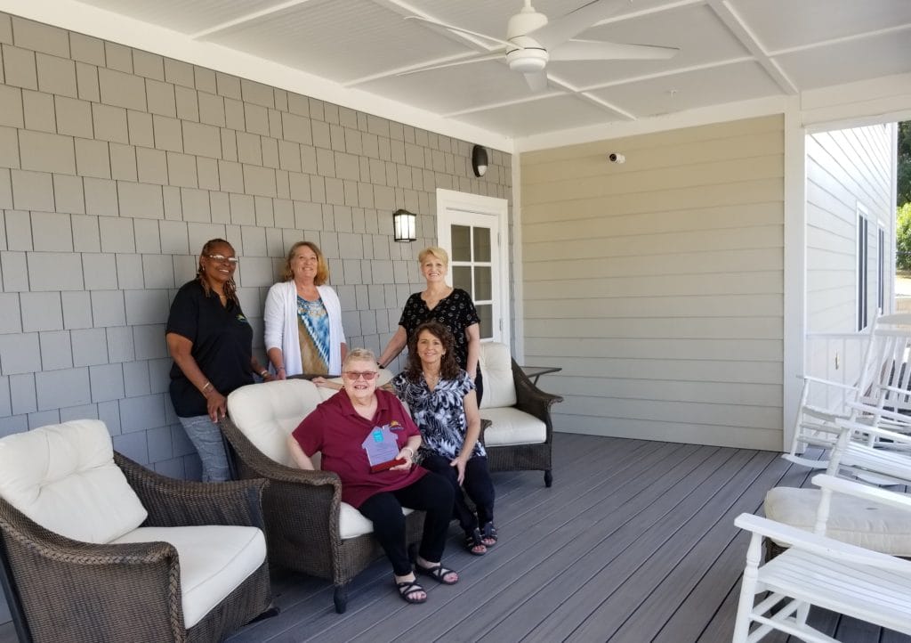 Susan Mowery, Sandie Alger, and TROSA Staff celebrate our North Carolina Housing Finance Agency Award for Supportive Housing Development, 2021